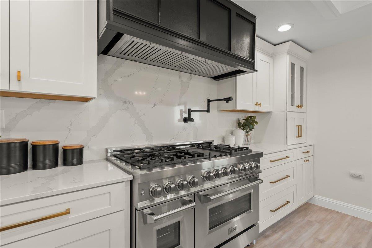 2915 Thomas Grde Morgan Hill, CA 95037 - Photo 18 of 87 a white stove top oven sitting inside of a kitchen