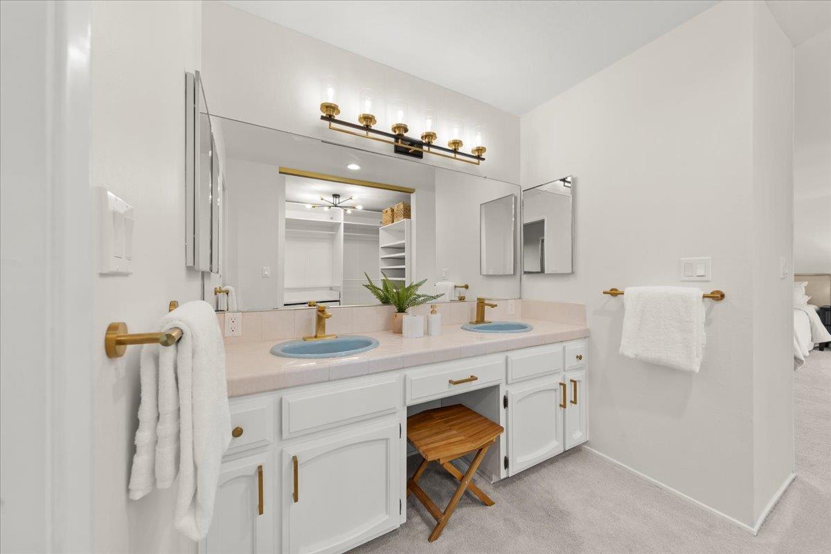 2915 Thomas Grde Morgan Hill, CA 95037 - Photo 28 of 87 a bathroom with a sink double vanity and a mirror