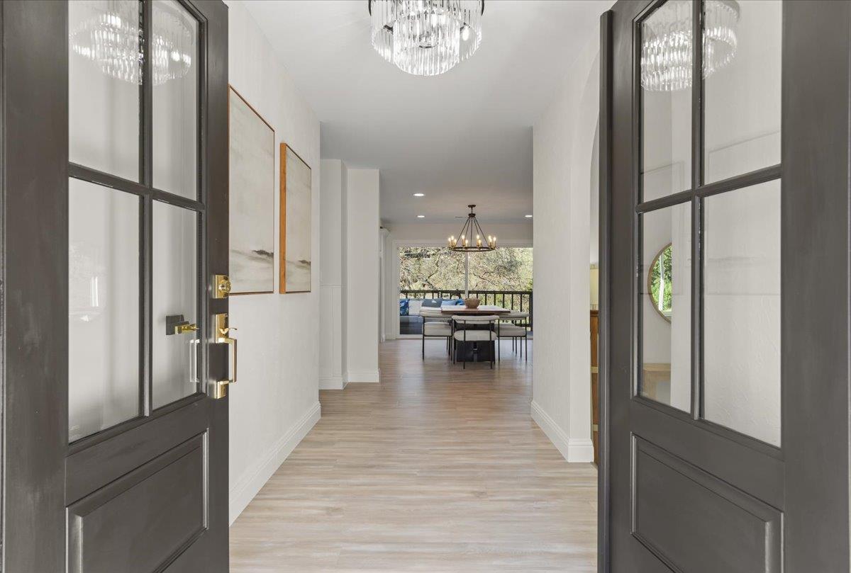2915 Thomas Grde Morgan Hill, CA 95037 - Photo 3 of 87 a view of a hallway view with wooden floor and seating space
