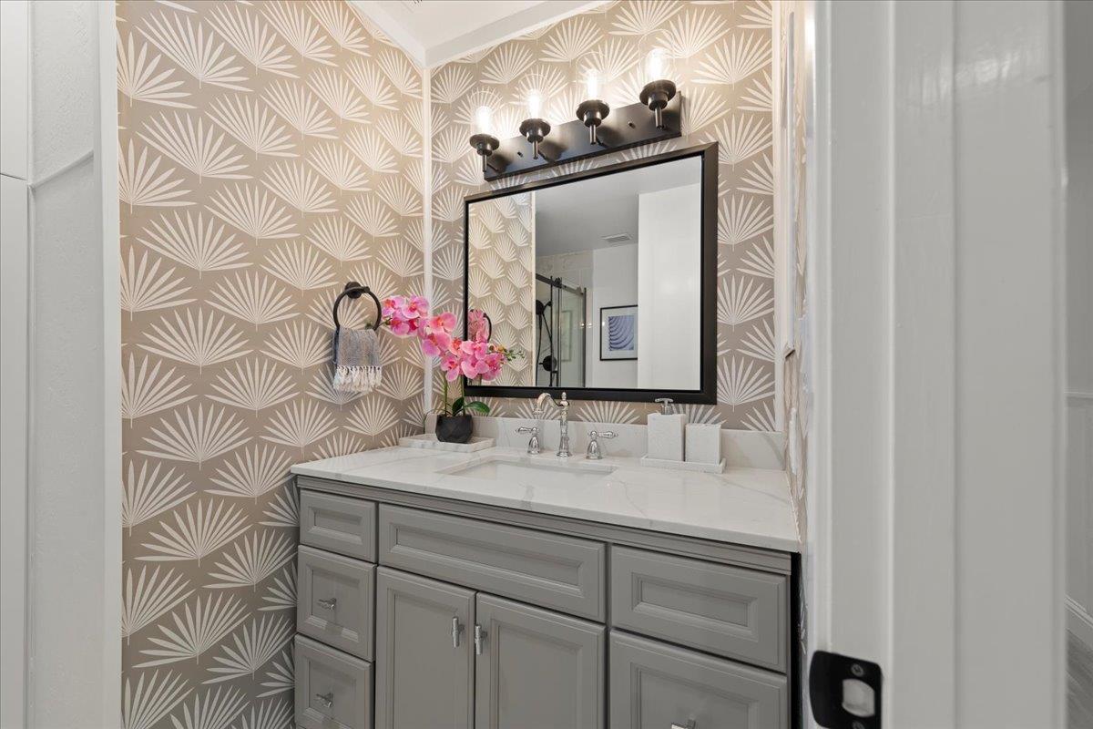 2915 Thomas Grde Morgan Hill, CA 95037 - Photo 38 of 87 a bathroom with a sink and a mirror
