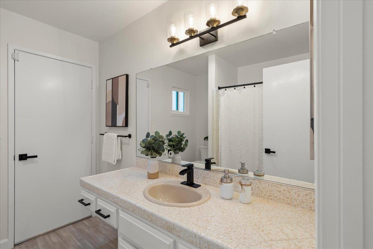 2915 Thomas Grde Morgan Hill, CA 95037 - Photo 50 of 87 a bathroom with a sink and a mirror