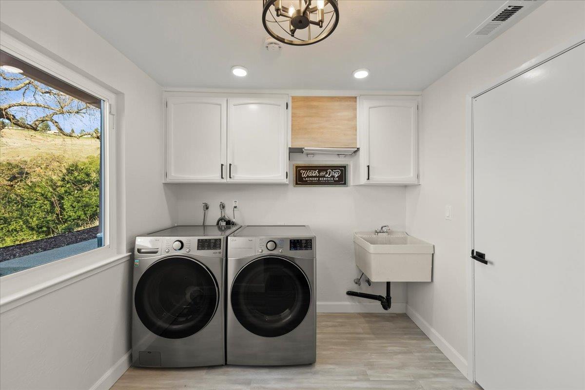 2915 Thomas Grde Morgan Hill, CA 95037 - Photo 55 of 87 a view of kitchen sink microwave and stove top oven