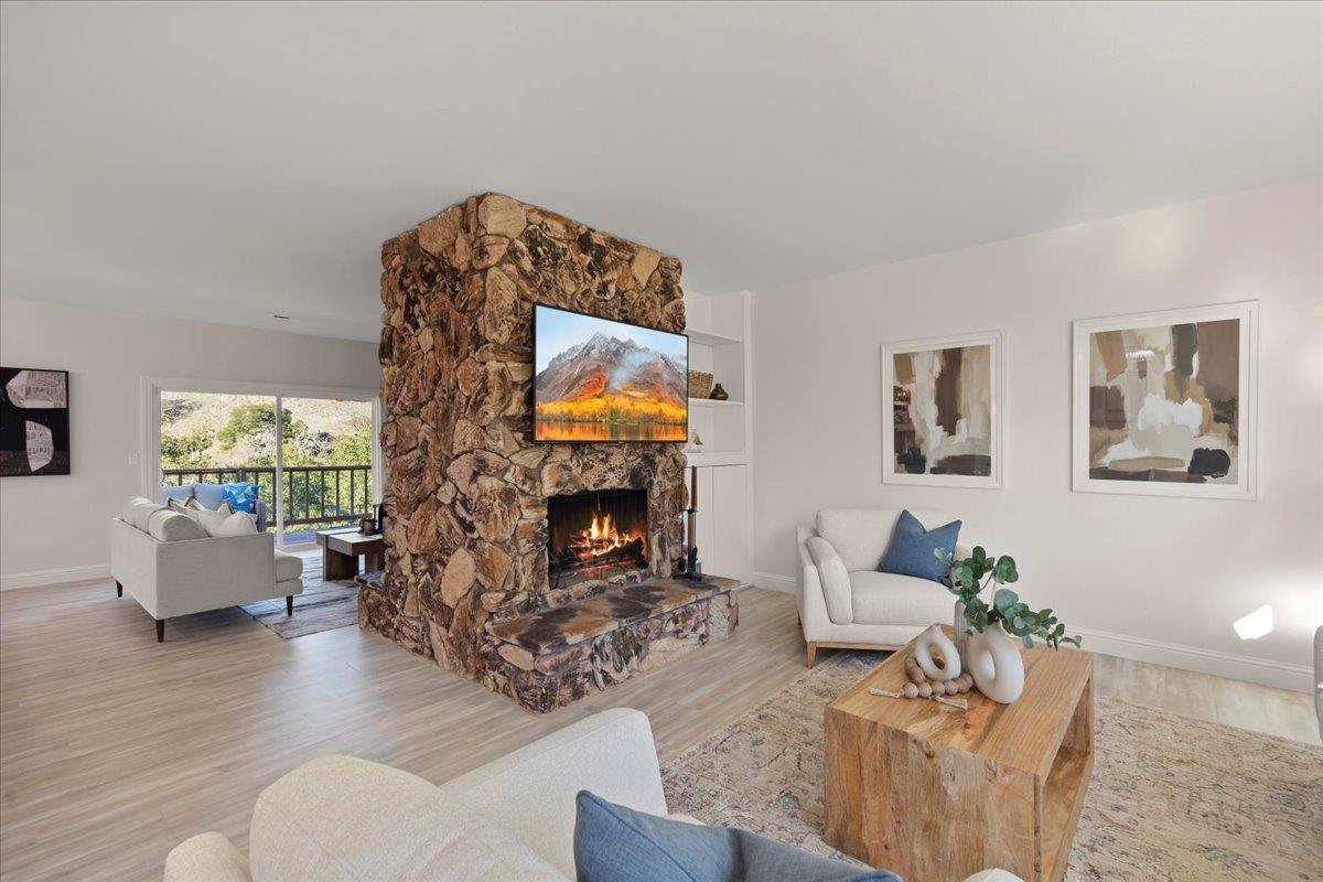 2915 Thomas Grde Morgan Hill, CA 95037 - Photo 6 of 87 a living room with fireplace furniture and a fireplace