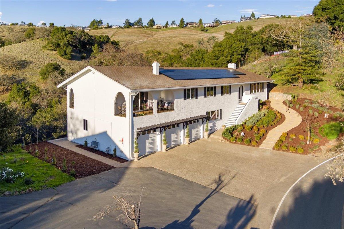 2915 Thomas Grde Morgan Hill, CA 95037 - Photo 68 of 87 a view of a big house with a big yard and large trees