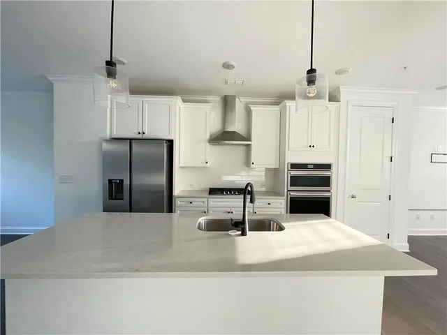 a bathroom with a toilet a sink and a window