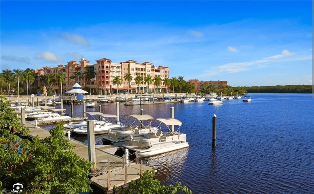 4084 New Moon Court Naples, FL 34112 - Photo 21 of 22 a view of a lake with sitting area