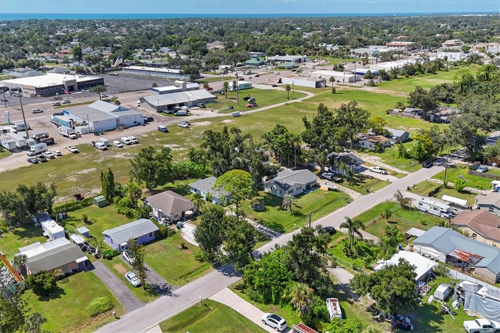 2214 Park Road Venice, FL 34293 - Photo 2 of 10 an aerial view of residential houses with outdoor space