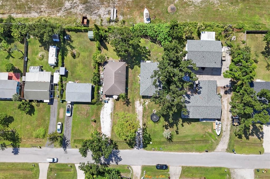 2214 Park Road Venice, FL 34293 - Photo 9 of 10 an aerial view of residential houses with outdoor space and street view