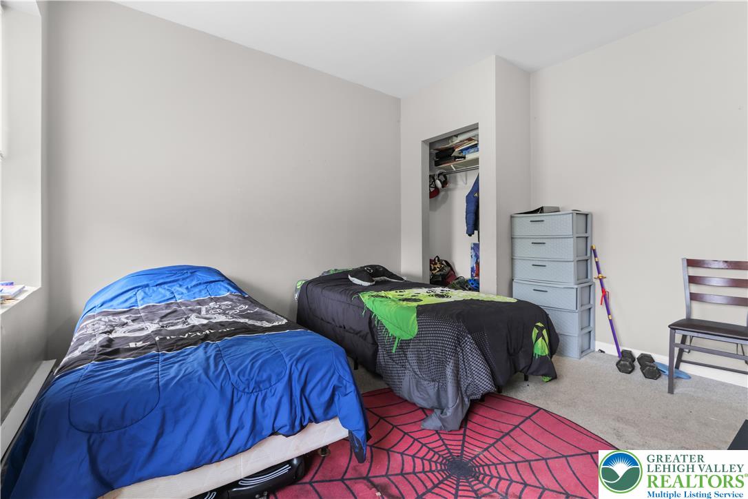 12 South Front Street Coplay, PA 18037 - Photo 28 of 41 This cozy room offers a comfortable and inviting atmosphere, perfect for rest and relaxation.