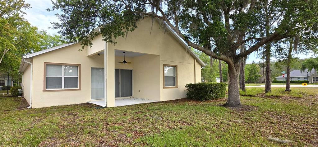 10906 Tree Cactus Loop Land O Lakes, FL 34638 - Photo 52 of 62 a front view of a house with garden