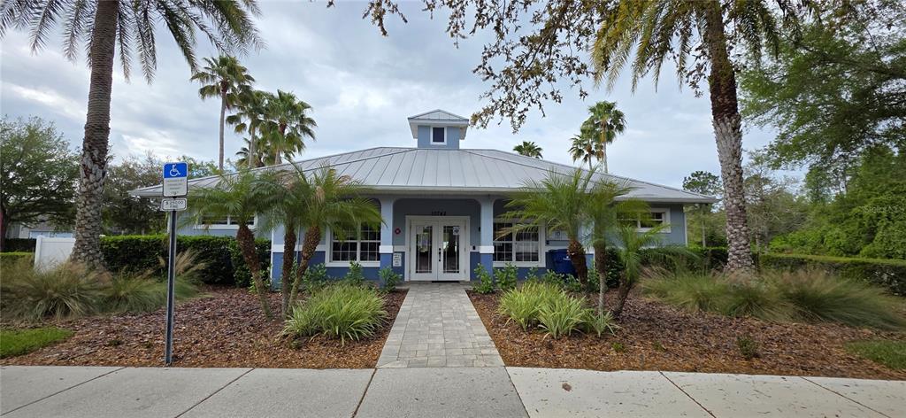 10906 Tree Cactus Loop Land O Lakes, FL 34638 - Photo 62 of 62 a front view of a house with garden