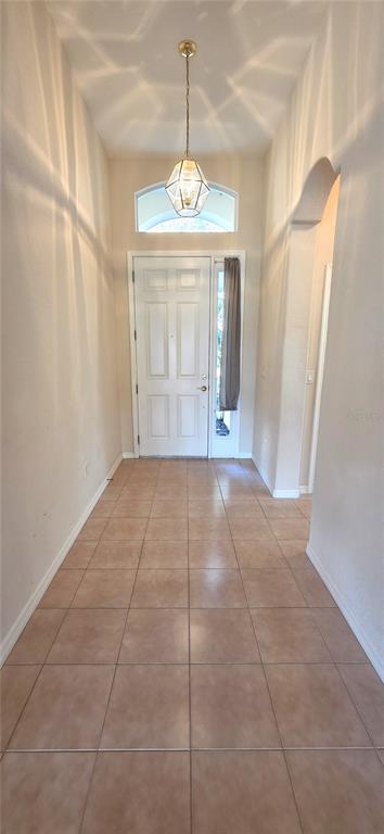 10906 Tree Cactus Loop Land O Lakes, FL 34638 - Photo 7 of 62 a view of an empty room with a window