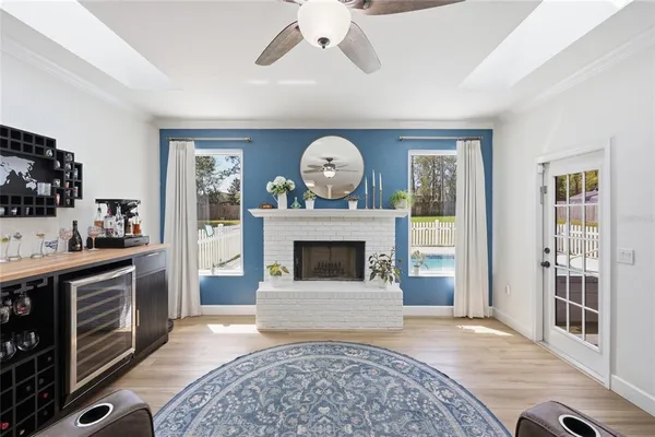 a kitchen with stainless steel appliances granite countertop a stove and white cabinets