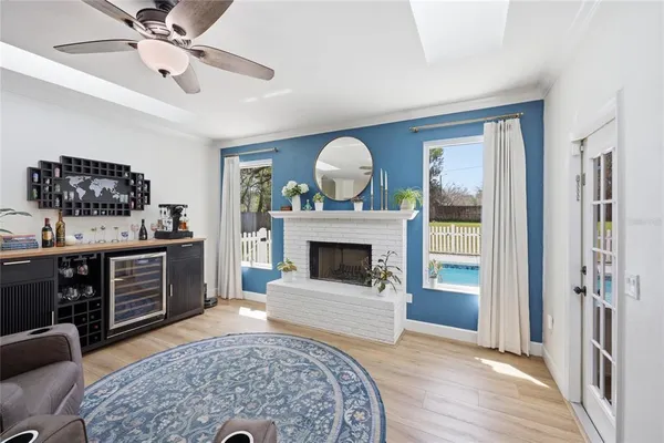 a kitchen with white cabinets stainless steel appliances and sink