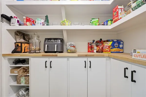 a white bath tub sitting in a bathroom