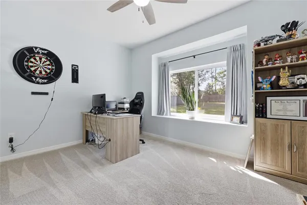 a view of a room with stairs and wooden floor