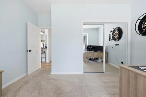 a bed room with a bed and a window