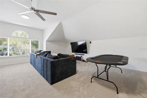 a view of a swimming pool with deck