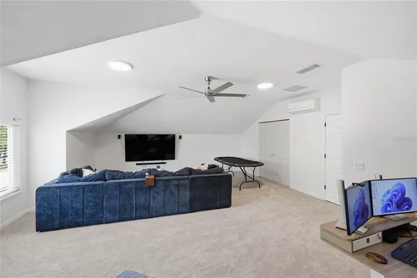 a front view of a house with a big yard