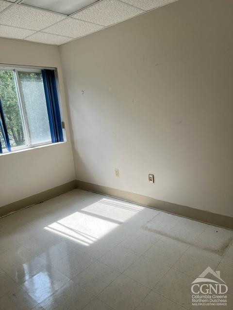 9 Law Street Coxsackie, NY 12192 - Photo 3 of 18 a view of an empty room and window