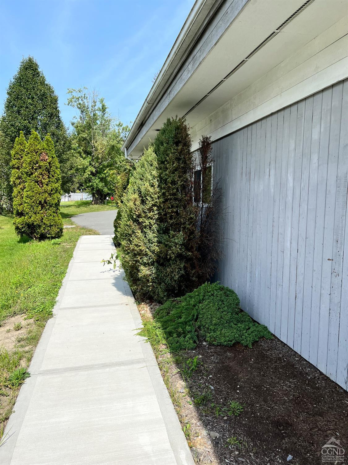 9 Law Street Coxsackie, NY 12192 - Photo 6 of 18 a view of path along with green space