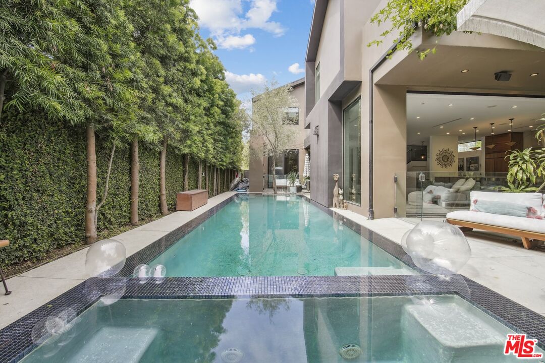 1506 Walnut Avenue Venice, CA 90291 - Photo 1 of 29 a view of a swimming pool with a patio