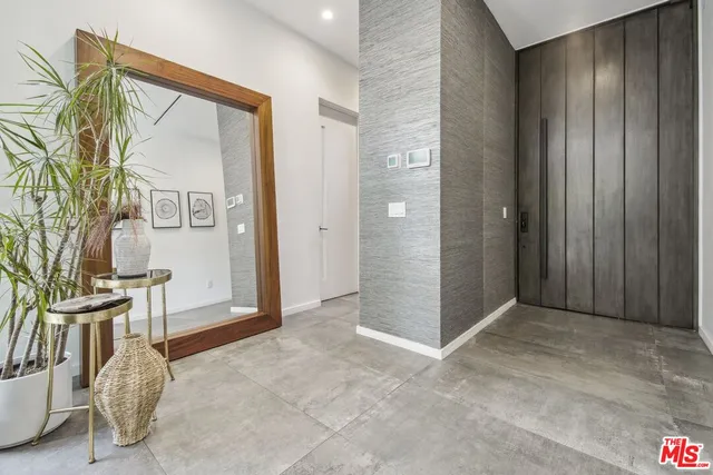 an empty room with shelves