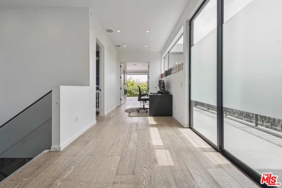1506 Walnut Avenue Venice, CA 90291 - Photo 13 of 29 a view of a hallway with wooden floor and staircase