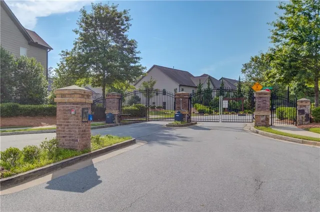 a view of park with large trees