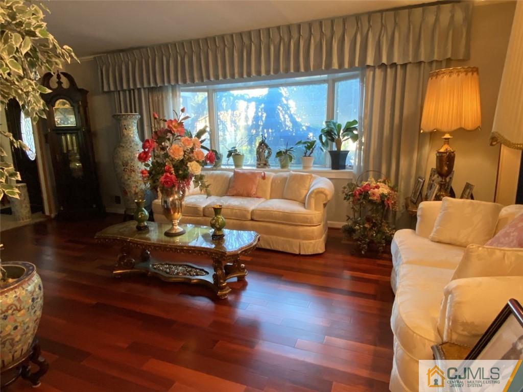 58 Brookside Road Edison, NJ 08817 - Photo 5 of 34 a living room with furniture and a large window