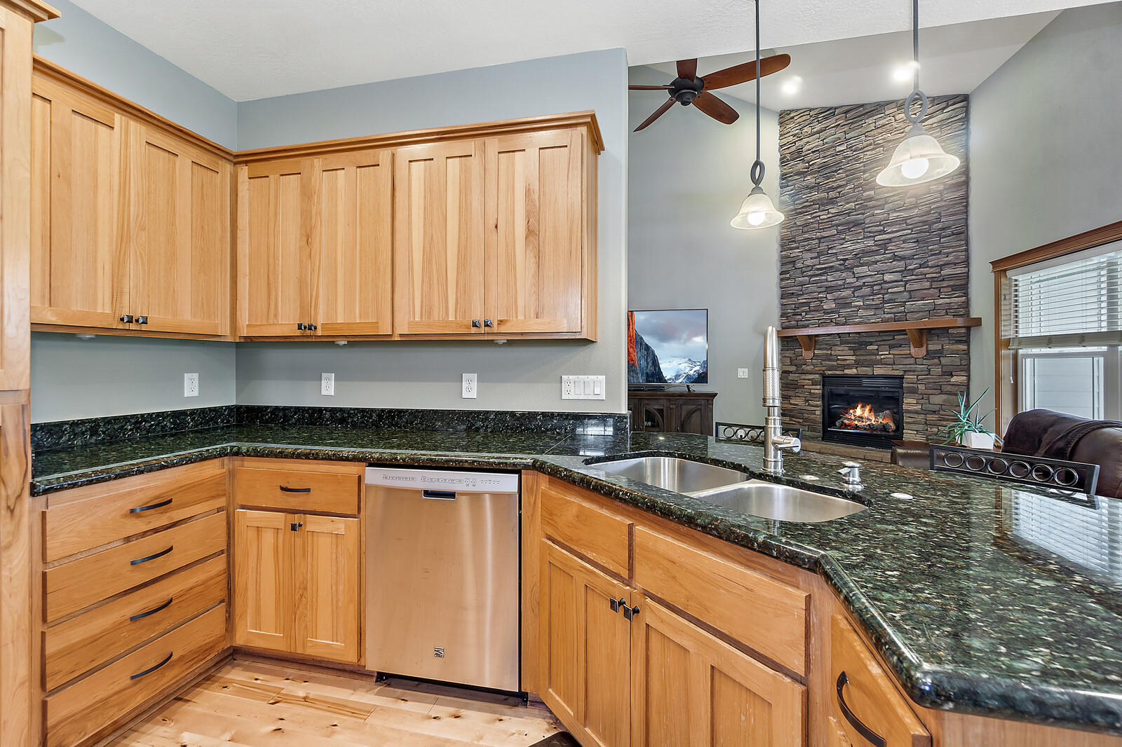 331 Ridgeway Avenue Central Point, OR 97502 - Photo 19 of 47 a kitchen with granite countertop a sink a stove and cabinets
