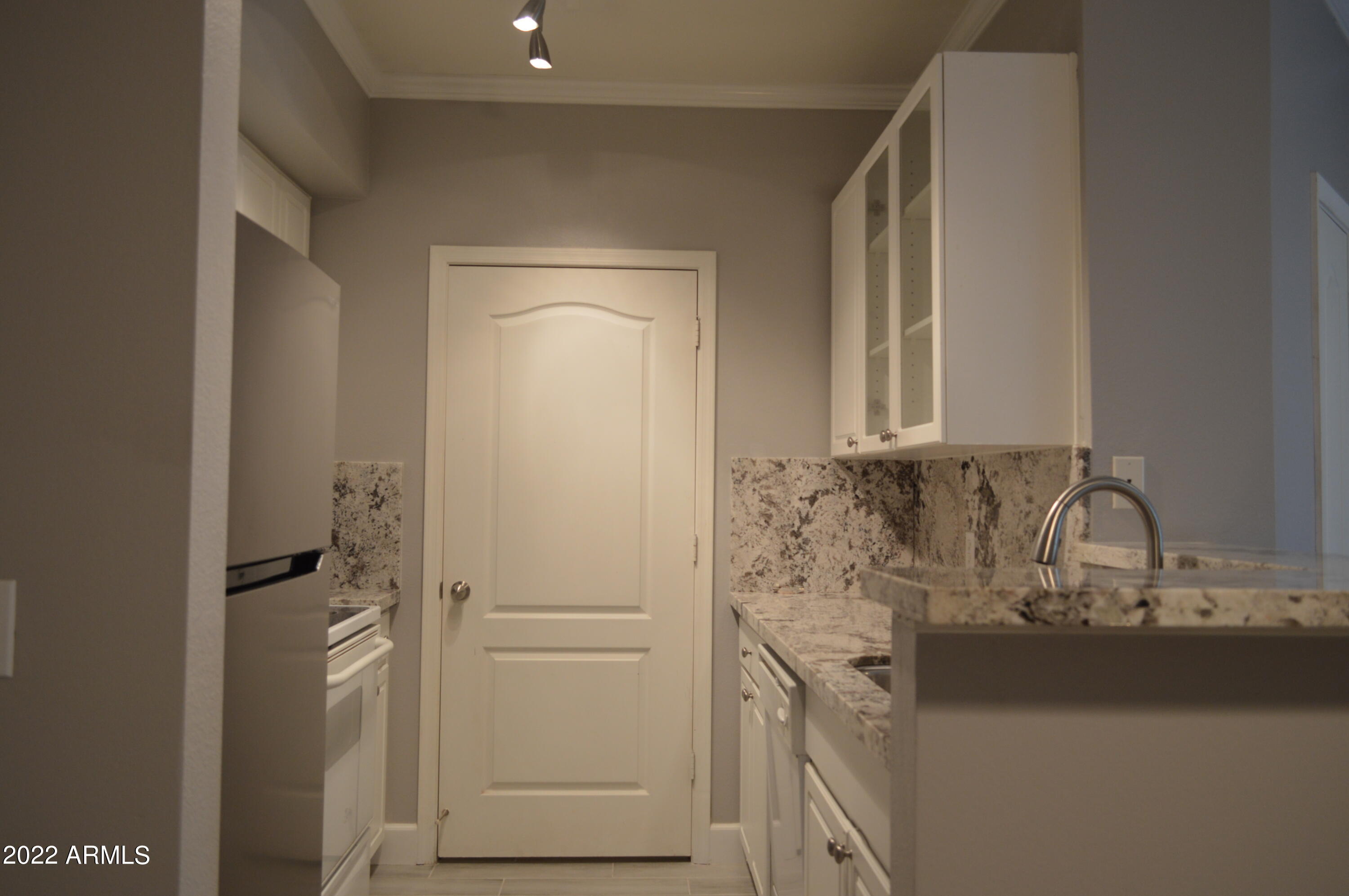 1701 East Colter Street, Unit 184 Phoenix, AZ 85016 - Photo 3 of 51 a bathroom with a sink and a mirror
