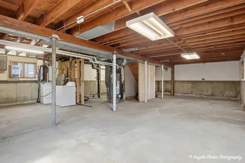 a view of a room with wooden walls