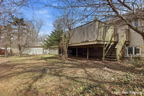 a house with trees in the background