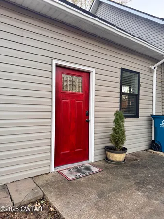 a view of a door and chair
