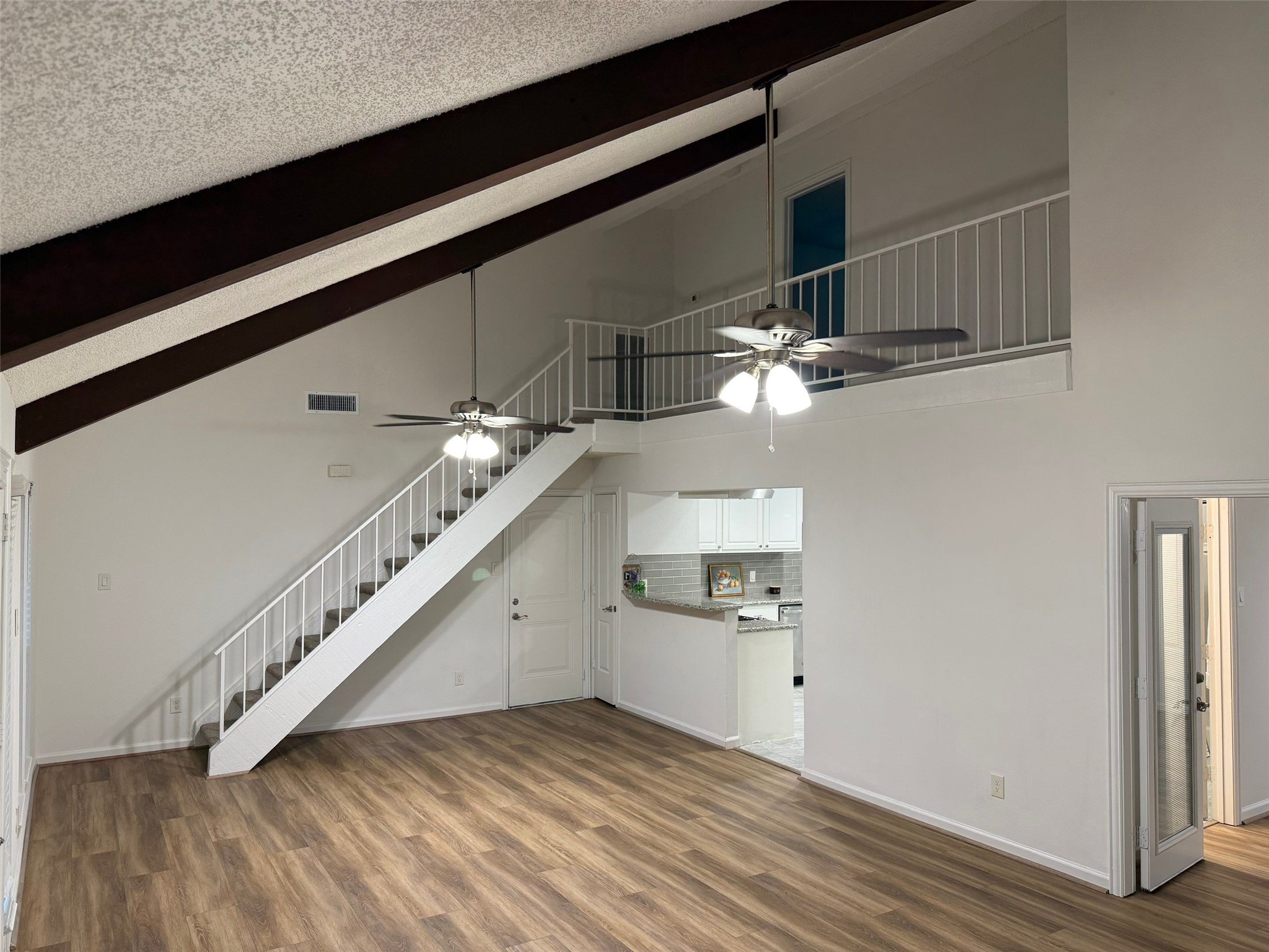 9626 Magnolia Ridge Drive Houston, TX 77070 - Photo 9 of 40 a view of a hallway with stairs