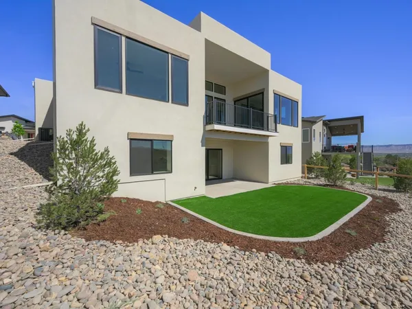 a view of a house with a garden