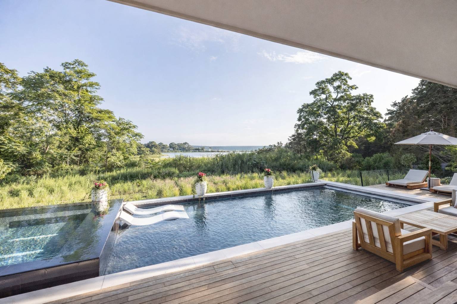 4 3rd Street Sag Harbor, NY 11963 - Photo 14 of 46 a view of swimming pool with lake view