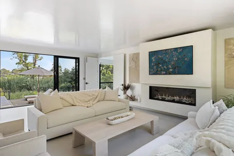 a living room with large window