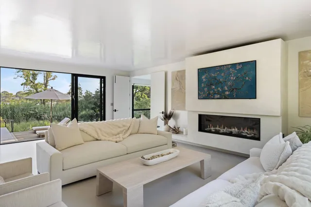 a living room with large window