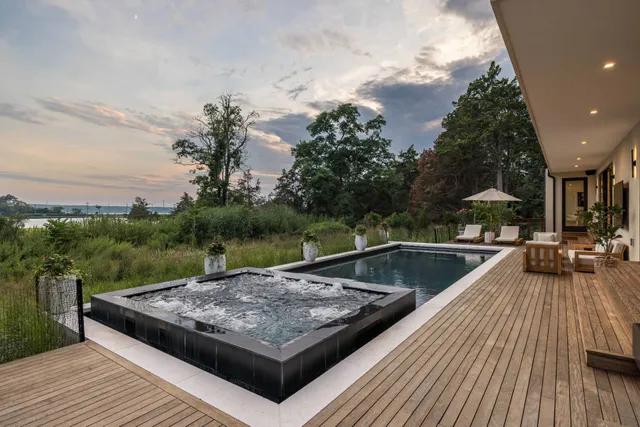 a view of a couches on the roof deck