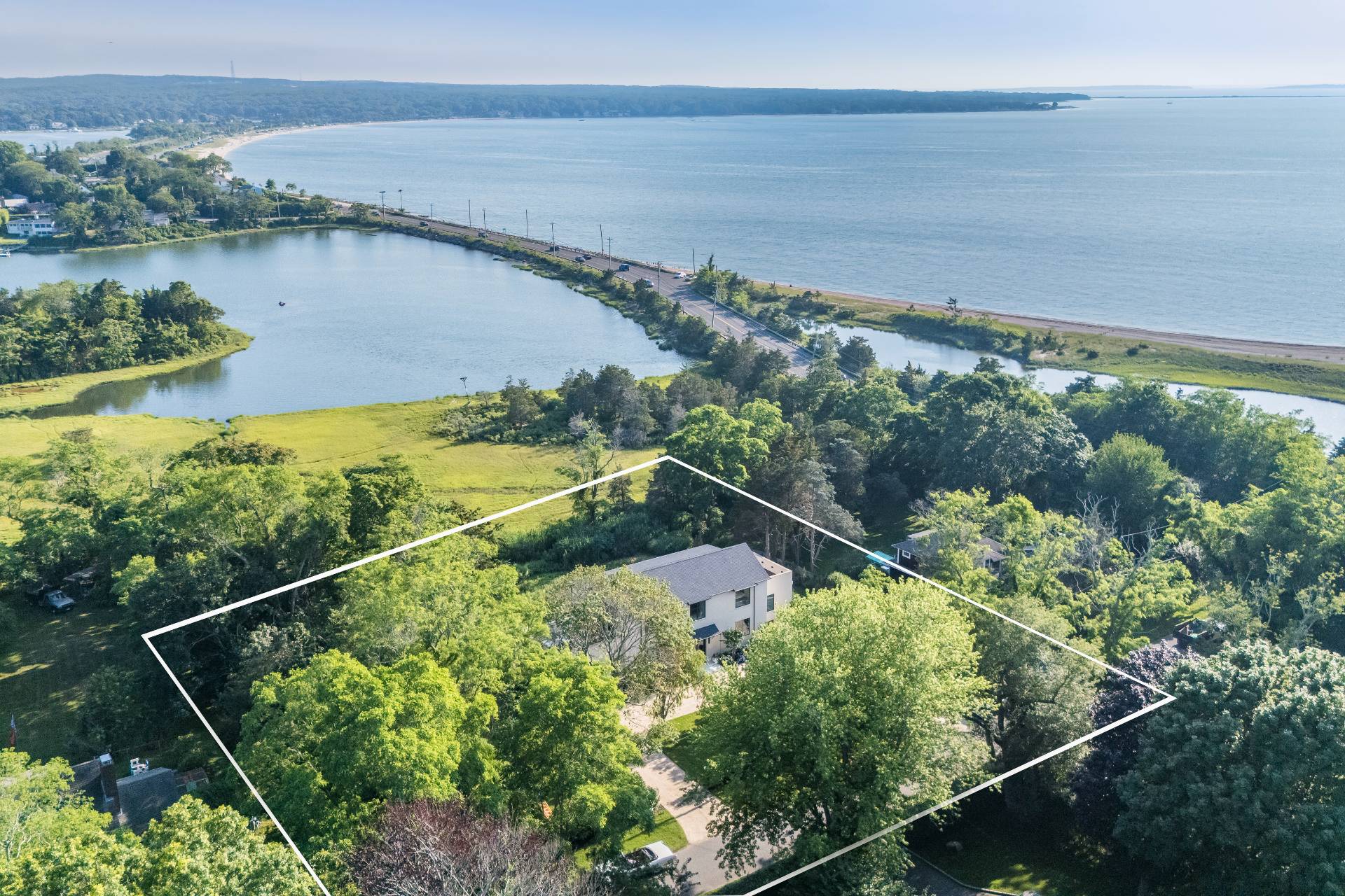 4 3rd Street Sag Harbor, NY 11963 - Photo 44 of 46 a view of a garden from a balcony
