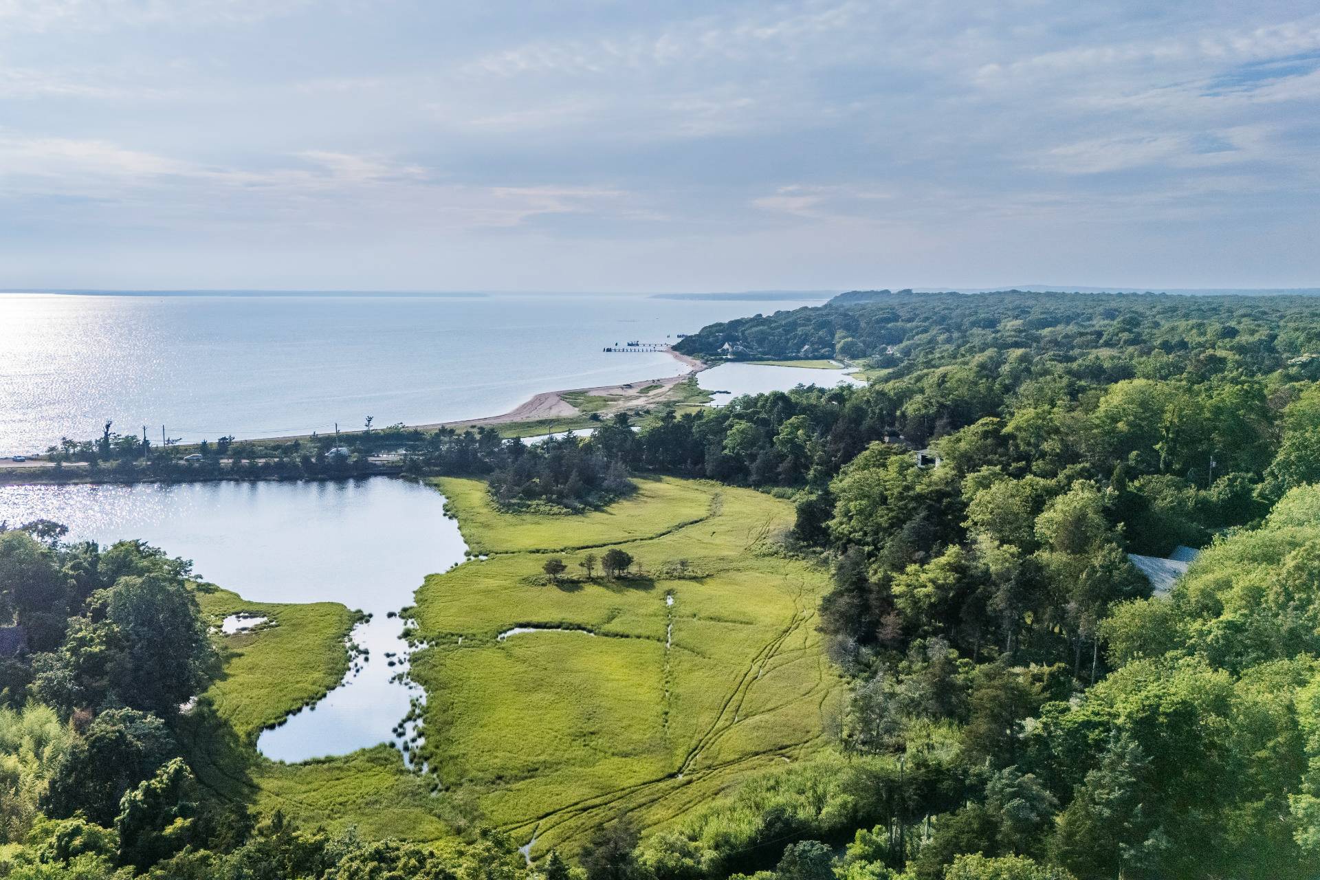 4 3rd Street Sag Harbor, NY 11963 - Photo 45 of 46 a view of a lake in middle of the forest