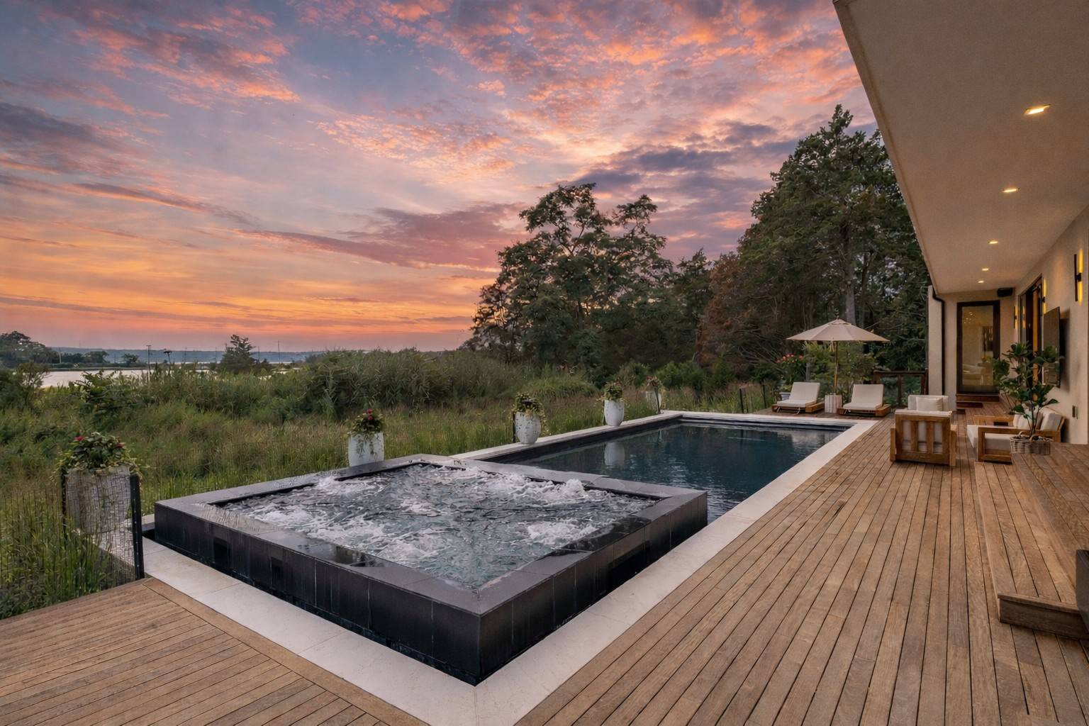 4 3rd Street Sag Harbor, NY 11963 - Photo 5 of 46 a view of a terrace from a balcony