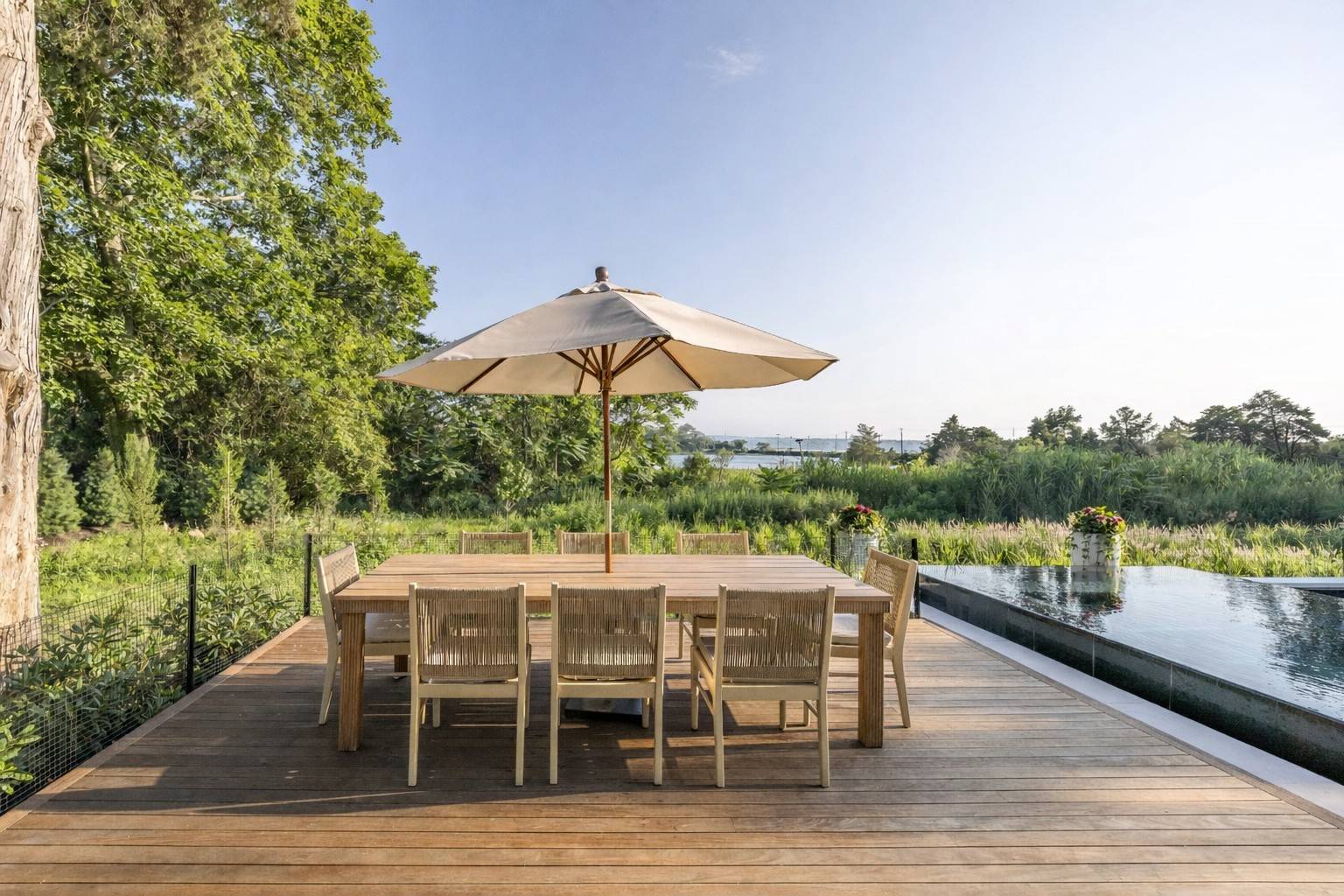 4 3rd Street Sag Harbor, NY 11963 - Photo 10 of 46 a patio with wooden floor and outdoor space