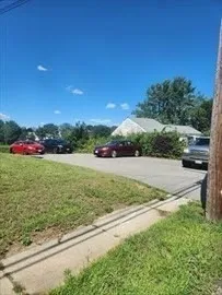 a view of a yard with an outdoor space