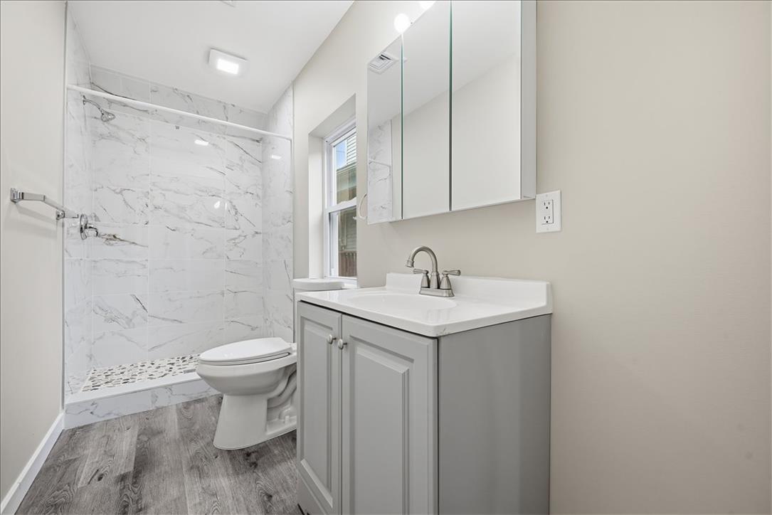 5641 North Coplay Road Whitehall, PA 18052 - Photo 36 of 68 A well-appointed bathroom with a spacious walk-in shower and modern vanity offers comfort and ease.