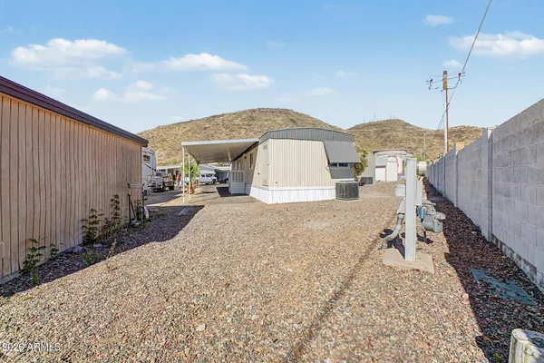 a view of a terrace with wooden fence