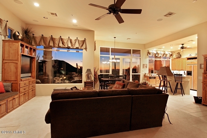 11059 East Turnberry Road Scottsdale, AZ 85255 - Photo 17 of 35 a living room with lots of furniture and a flat screen tv