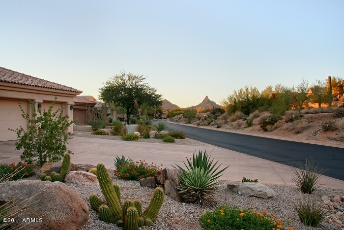 11059 East Turnberry Road Scottsdale, AZ 85255 - Photo 30 of 35 a view of a terrace with a garden